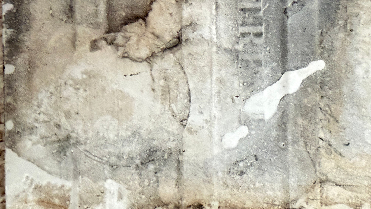 Close view of the aged ceramic reverse of an antique Minton decorative tile