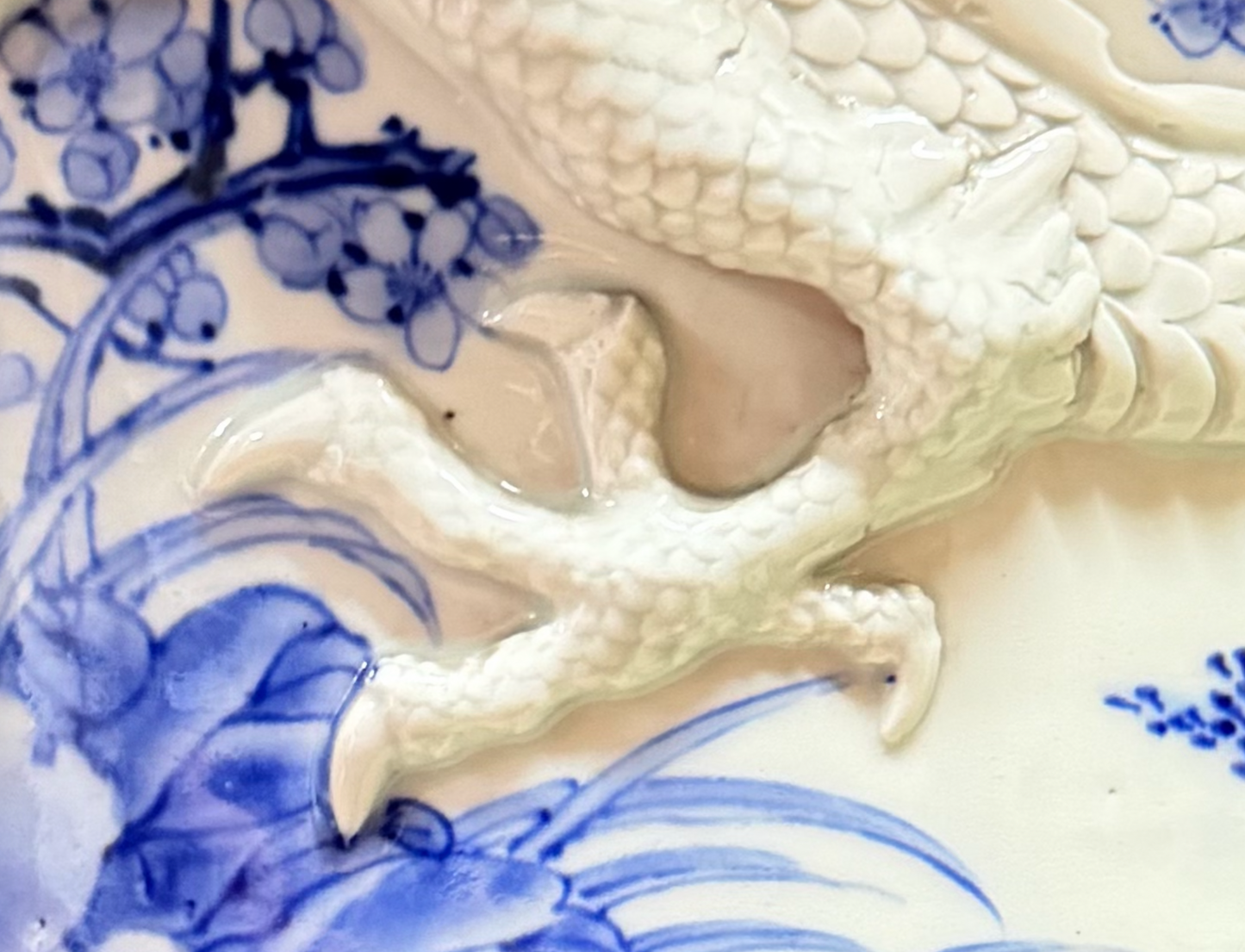 Condition detail of the applied dragon’s leg and claw on the Japanese jardinière.