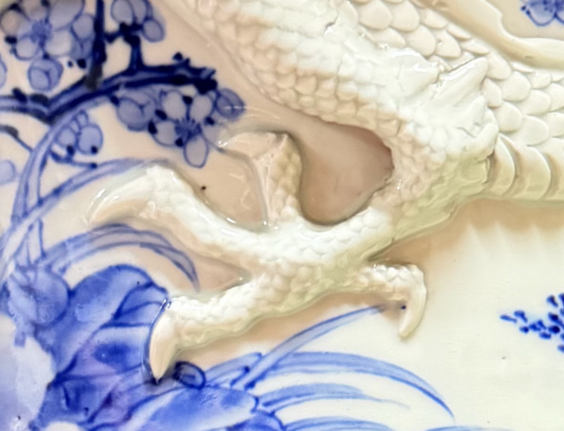 Condition detail of the applied dragon’s leg and claw on the Japanese jardinière.
