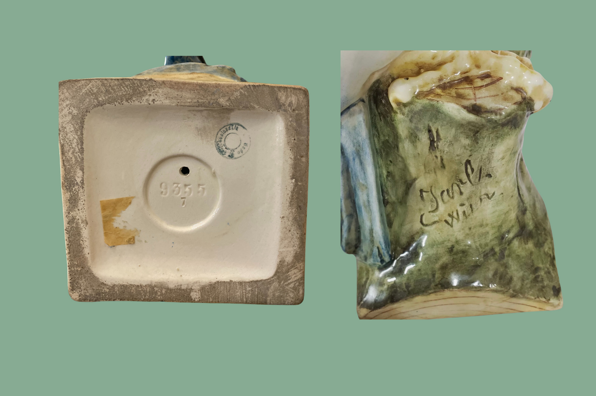 Royal Dux cockatoo base with impressed mold number 9355, paper label, and handwritten mark.