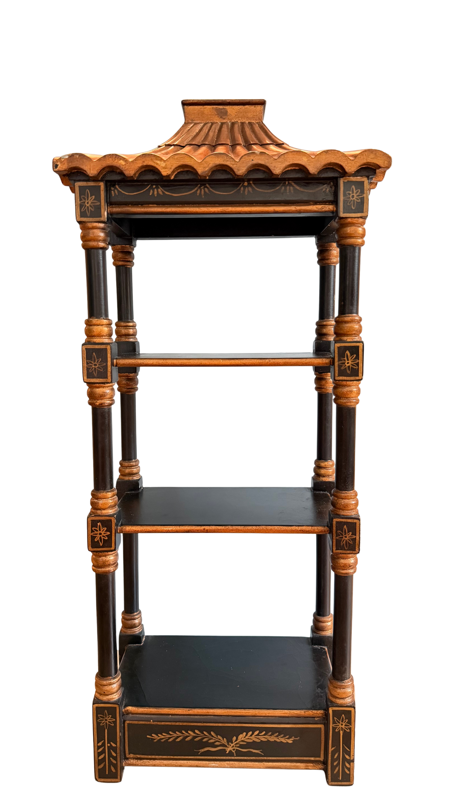 Vintage black and gold chinoiserie pagoda wall shelf with three tiers and turned supports.